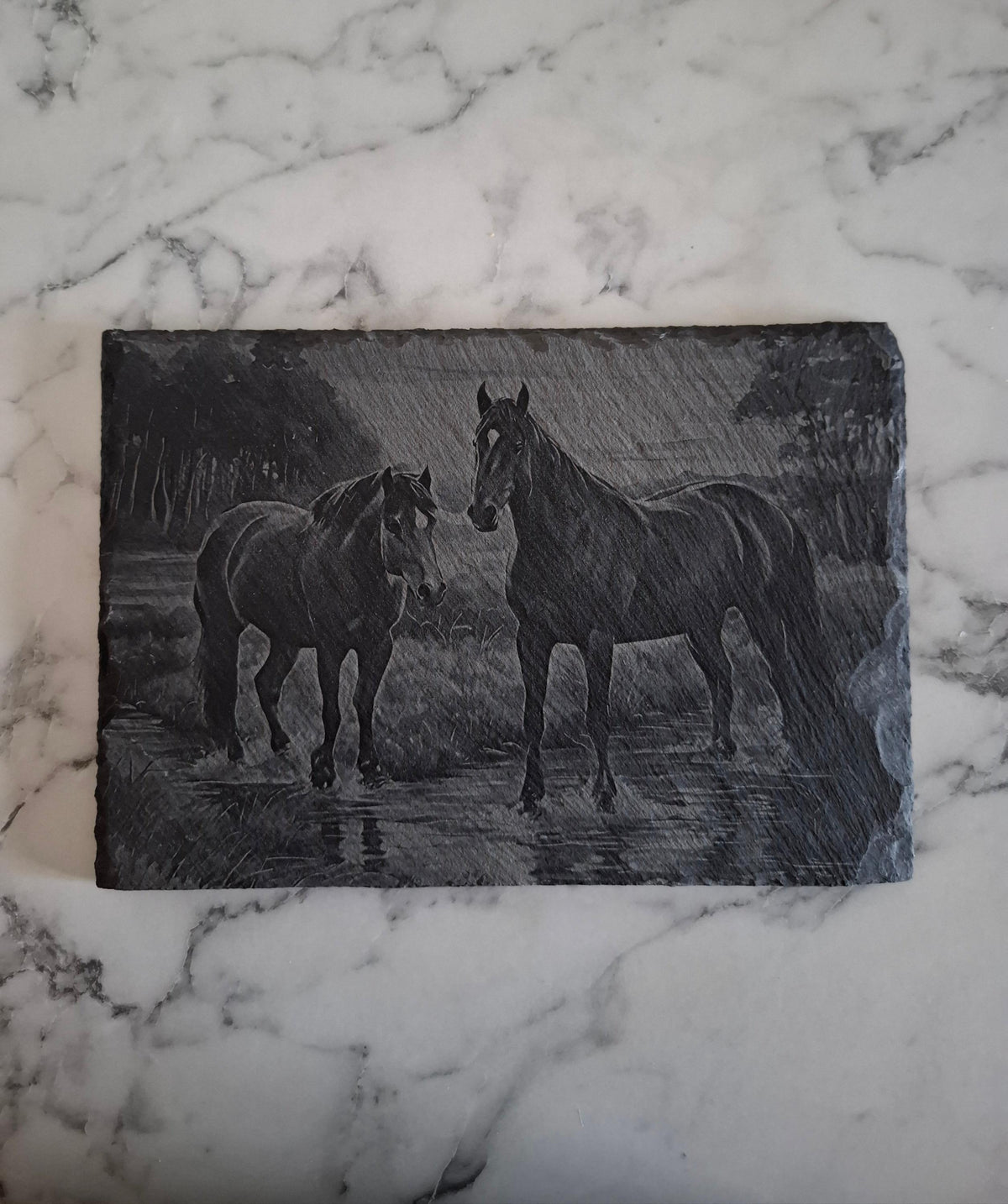 Stunning laser-engraved slate featuring detailed horses