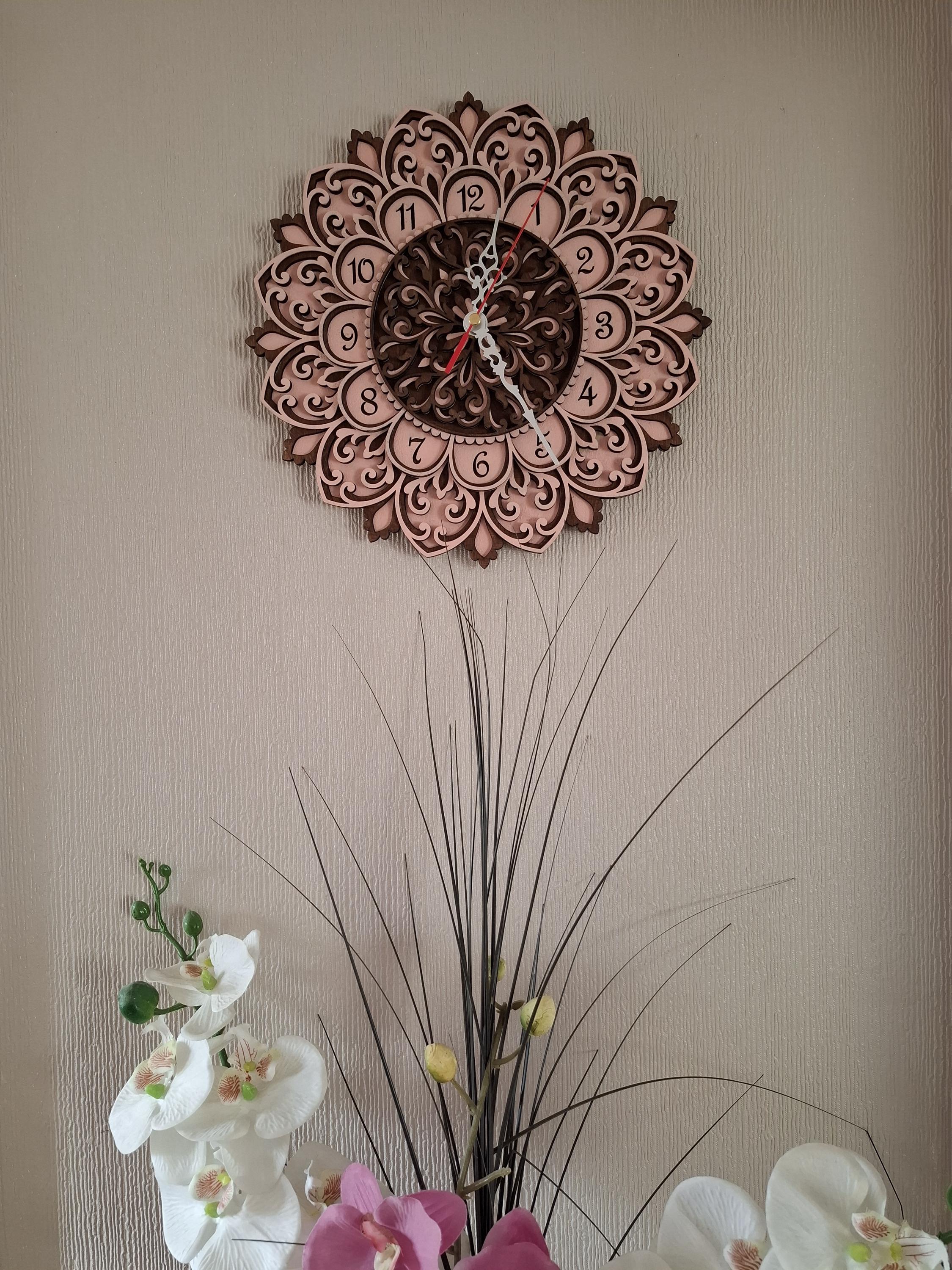 Multi layered laser cut wall art Clock.